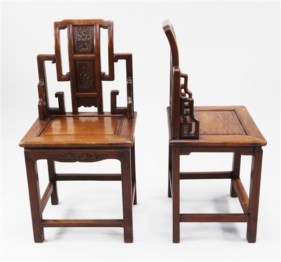 A pair of Chinese rosewood hall chairs,